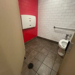 Clean restroom and diaper changing station.