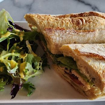 Le Cafe Du Val - Chicken Sandwich Dijon mustard chicken, mixed greens, tomatoes, bacon, swiss cheese, basil sauce on baguette - Cafes Near Me - Henderson, Nevada