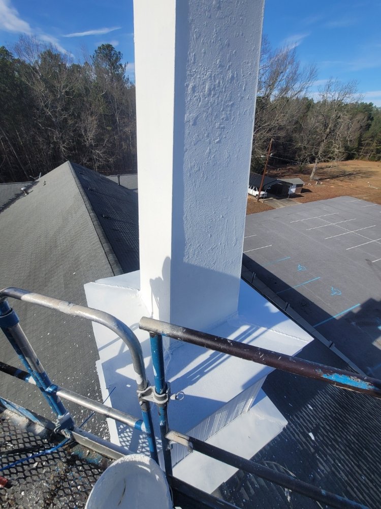 Slide of E. Thompson Roofing