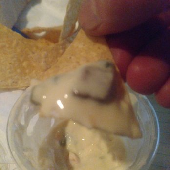 Chipotle Mexican Grill - Pieces of steak (or pork or some other meat) in the queso... :-/ - Mexican Near Me - Manchester, Connecticut
