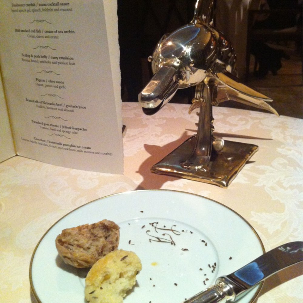 Lorenz Adlon Esszimmer - Dolphin helping himself to my bread - Modern European Near Me - Berlin, BE