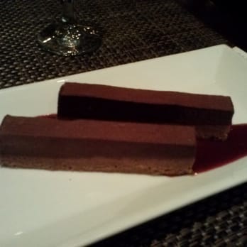 Bistronomic - Dessert: Chocolate Hazelnut Bars $8 (part of the $40 Prix Fixe Menu). Strawberry coulis. - New American Near Me - Chicago, Illinois Bistronomic - Dessert: Chocolate Hazelnut Bars $8 (part of the $40 Prix Fixe Menu). Strawberry coulis. - New American Near Me - Chicago, Illinois