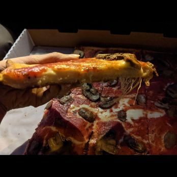 Santucci's Original Square Pizza and Bar - A slice of the Large 17" Signature Pie with Mushrooms - Pizza Near Me - Philadelphia, Pennsylvania Santucci's Original Square Pizza and Bar - A slice of the Large 17" Signature Pie with Mushrooms - Pizza Near Me - Philadelphia, Pennsylvania