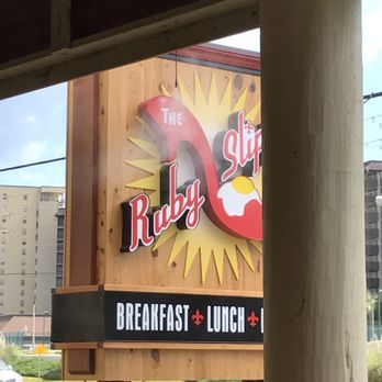 Ruby Slipper Orange Beach - Outdoor sign and misters on the porch. - Cafes Near Me - Orange Beach, Alabama