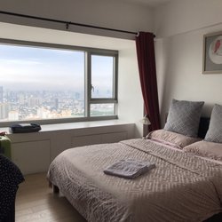 One Shangri-La Place - Room with bench like seats by window (49th floor!)