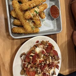 Happy hour personal pizza and Mozzarella Sticks