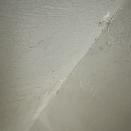 Corners of the walls inside the closet.
