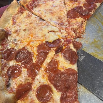 Original Santos Wood Fired Pizza - Half cheese half pepperoni - Italian Near Me - Jensen Beach, Florida Original Santos Wood Fired Pizza - Half cheese half pepperoni - Italian Near Me - Jensen Beach, Florida