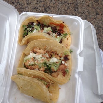 Eggs Travaganza - Two chicken tacos and one steak (on top) - Breakfast & Brunch Near Me - New York, New York Eggs Travaganza - Two chicken tacos and one steak (on top) - Breakfast & Brunch Near Me - New York, New York