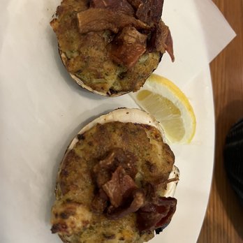 Winthrop Arms Restaurant - Quahog topped with bacon! Looks smaller in photo. This is delish and filling!! - Seafood Near Me - Winthrop, Massachusetts Winthrop Arms Restaurant - Quahog topped with bacon! Looks smaller in photo. This is delish and filling!! - Seafood Near Me - Winthrop, Massachusetts