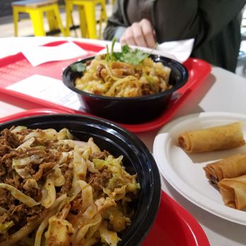 Xi’an Noodles - "Cumin Lamb Biang Noodle"(front), "Mount Q Pork Noodles" (back) and crispy spring rolls. - Noodles Near Me - Seattle, Washington Xi’an Noodles - "Cumin Lamb Biang Noodle"(front), "Mount Q Pork Noodles" (back) and crispy spring rolls. - Noodles Near Me - Seattle, Washington