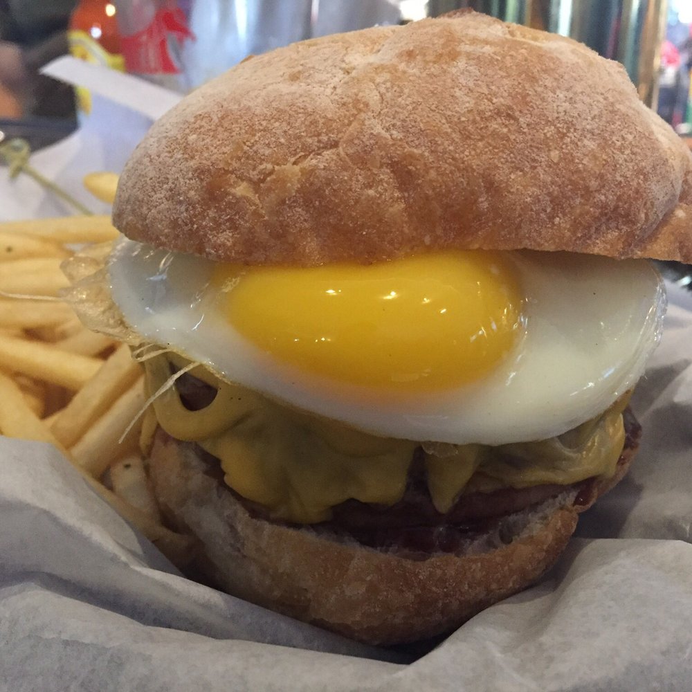 Corkscrew Bar - Brunch burger, American cheese, Taylor ham, sriracha aioli, and an over easy egg - Pubs Near Me - Jersey City, New Jersey Corkscrew Bar - Brunch burger, American cheese, Taylor ham, sriracha aioli, and an over easy egg - Pubs Near Me - Jersey City, New Jersey