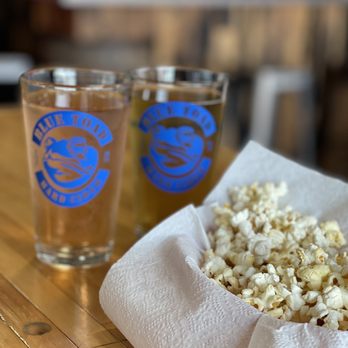 Blue Toad Hard Cider - popcorn and a glass of beer - Breweries Near Me - Rochester, New York