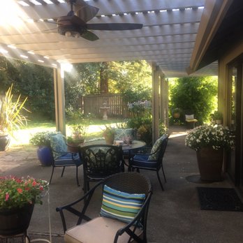 Biba's A2Z Home Improvement - a patio with a pergol roof - Windows Installation Near Me Biba's A2Z Home Improvement - a patio with a pergol roof - Windows Installation Near Me