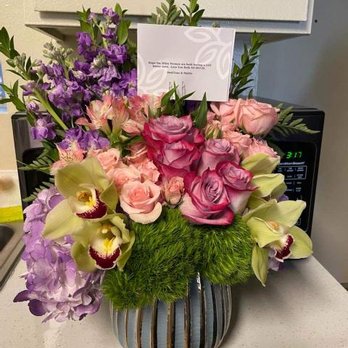 Flower Synergy - lighting not great. Flower arrangement looks a LOT better in real life. Love It. - Florists Near Me - Costa Mesa, California Flower Synergy - lighting not great. Flower arrangement looks a LOT better in real life. Love It. - Florists Near Me - Costa Mesa, California