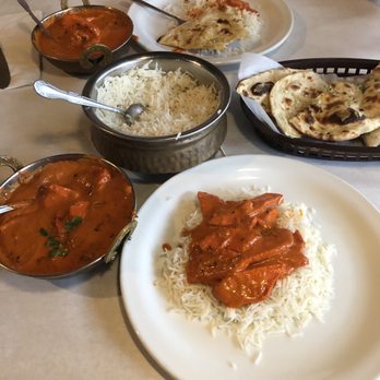 Sacred Spice - Butter Chicken and garlic a naan. - Indian Near Me - Clearwater, Florida Sacred Spice - Butter Chicken and garlic a naan. - Indian Near Me - Clearwater, Florida