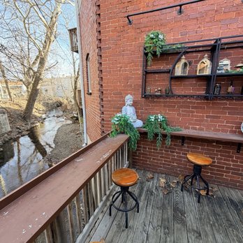 Panhandle Apothecary - Back patio overlooking creek - Vitamins & Supplements Near Me - Berkeley Springs, West Virginia