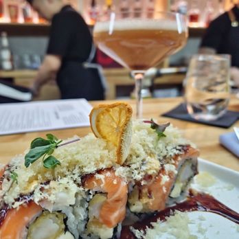 Fukuro Bar & Sushi - "Hot Gossip"  (Shrimp tempura, cream cheese topped w/ salmon, ebi (cooked shrimp), crunch, spicy aioli, kabayaki sauce) - Sushi Bars Near Me - Evans, Georgia