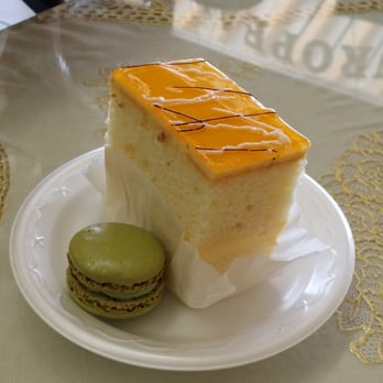 European Bakery and Cafe - Mango mousse and pistachio macaron - Desserts Near Me - Glendale, Arizona European Bakery and Cafe - Mango mousse and pistachio macaron - Desserts Near Me - Glendale, Arizona