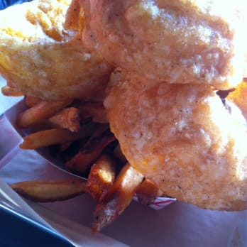 BurgerFi - Half and half onion rings and fries - Burgers Near Me - Winter Park, Florida BurgerFi - Half and half onion rings and fries - Burgers Near Me - Winter Park, Florida