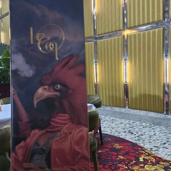 Le Coq - I love this place already. Showcasing my favorite kung fu animal! - French Near Me - La Jolla, California