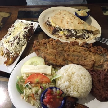 Paseo Catracho - Breaded steak with all sides, platano rellenos and steak and egg baleada. - Honduran Near Me - Miami, Florida