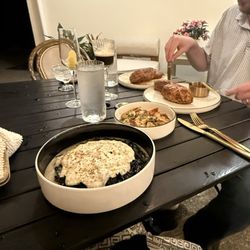 Siren Social Club - Cacio e pepe, garlic shrimp, beef Wellington, fried eggplant.