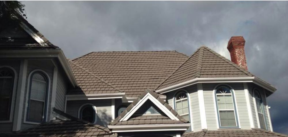 Slide of Douglas Cote Roofing