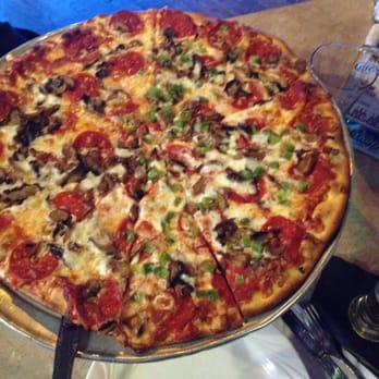 Vic's Place - Large pizza with 3 toppings yum! - Bars Near Me - Flint, Michigan
