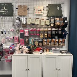 Grand Jete - Accessories, gifts, dance socks, and Grand Jeté merchandise on display.