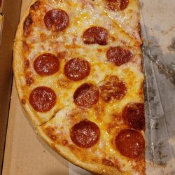 Village House of Pizza - Terrible crust for 20 dollars. Frozen pizza from store would be better.
