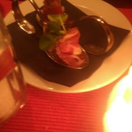 Amuse bouche parma ham with cheese