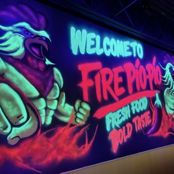 Fire Pio Pio - Look at how cool! They have a black light shining on this wall. It looks way better in person! - Chicken Wings Near Me - Colorado Springs, Colorado Fire Pio Pio - Look at how cool! They have a black light shining on this wall. It looks way better in person! - Chicken Wings Near Me - Colorado Springs, Colorado