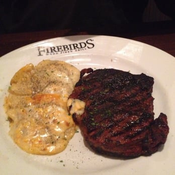 Firebirds Wood Fired Grill - Delmonico with cheesy potatoes - Steakhouses Near Me - Hoover, Alabama