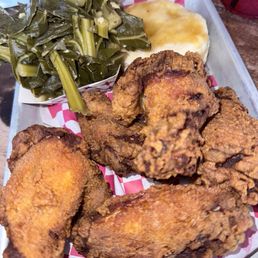 Friday special: Pepe fried wings and a biscuit. Collard greens (vegan) were an add on