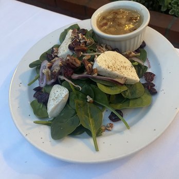 Madeline's - Baby Spinach Salad , Bacon dressing on side, toasted pecans. Yummy - New American Near Me - Cambria, California Madeline's - Baby Spinach Salad , Bacon dressing on side, toasted pecans. Yummy - New American Near Me - Cambria, California
