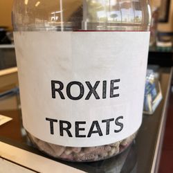 Jersey Pawn - when you come in the owner will let you give Roxy treat and she will give you her paw.