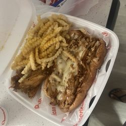 American Deli - Five piece wings, no flavor fries and a chicken Philly not fully loaded with the extra stuff