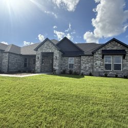 Texas Heat Auto Tint - After with 10% Twilight film applied to the front of the house for heat rejection and privacy
