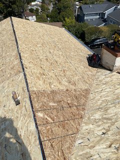 Slide of Adams Roofing