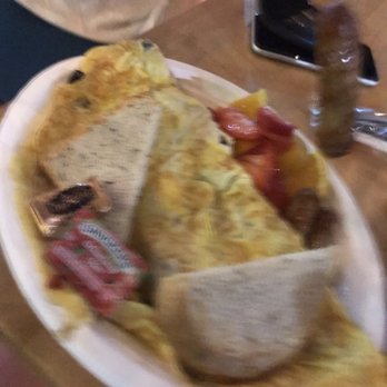 Crave Cafe Studio City - Greek Omelette. Huge portion, but tasted flavorless. I used an entire bottle of Tapatito to try to make it edible. - Cafes Near Me - Studio City, California Crave Cafe Studio City - Greek Omelette. Huge portion, but tasted flavorless. I used an entire bottle of Tapatito to try to make it edible. - Cafes Near Me - Studio City, California