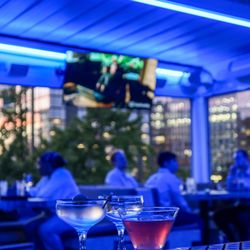 Over Under Rooftop Sports Bar - Martinis + open air vibes while catching up with an old friend. $7 martinis every thursday!