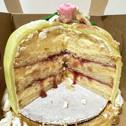 Layer upon layer of cake, raspberry jam, and Bavarian cream Layer upon layer of cake, raspberry jam, and Bavarian cream