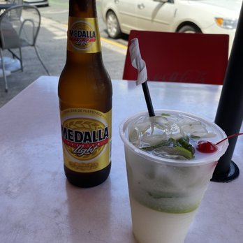 La Vergüenza - Medalla (Puerto Rican beer) and Delicious Mojito - many flavors available - Puerto Rican Near Me - San Juan, Puerto Rico La Vergüenza - Medalla (Puerto Rican beer) and Delicious Mojito - many flavors available - Puerto Rican Near Me - San Juan, Puerto Rico