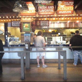 Cafe Rio Fresh Modern Mexican - As you enter the restaurant, you make your selection from the menu, posted at the left of the photo, and then you enter the serving line. - Mexican Near Me - Billings, Montana Cafe Rio Fresh Modern Mexican - As you enter the restaurant, you make your selection from the menu, posted at the left of the photo, and then you enter the serving line. - Mexican Near Me - Billings, Montana