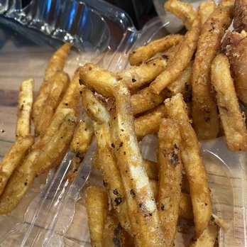 World Famous - The black stuff you see isn't pepper. It's charred leftovers of whatever was previously burnt in the oil. Tasted chemically. - Food Trucks Near Me - Hollywood, Florida