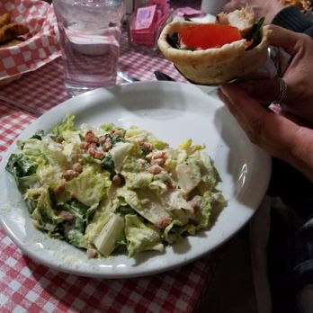Jimmy's Special Pizza - a person eating a salad - Pizza Near Me - Stirling, Ontario Jimmy's Special Pizza - a person eating a salad - Pizza Near Me - Stirling, Ontario