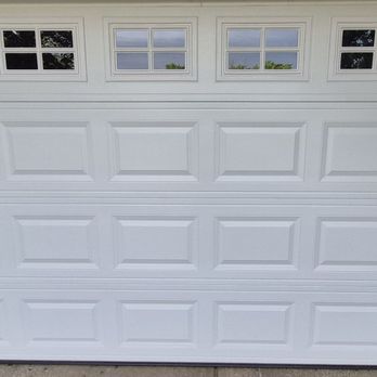 Accurate Garage Door Services - Panel has a gap big enough to put dimes in. Was told "can not fix it" - Garage Door Services Near Me