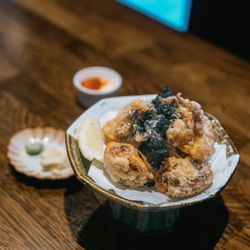 Squid Legs! Not only presented well, but perfectly fried, topped with crushed seaweed and a side of lemon slice to give it that zingy flavor