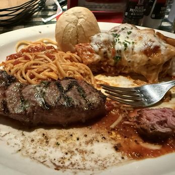 Johnny Carino's - Italian Combination: Ribeye Steak 8 oz, Lasagna and Spaghetti with tomato sauce. - Italian Near Me - Eastvale, California Johnny Carino's - Italian Combination: Ribeye Steak 8 oz, Lasagna and Spaghetti with tomato sauce. - Italian Near Me - Eastvale, California